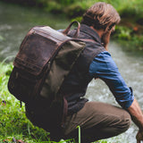 'The Jack' backpack in vintage brown leather and green canvas.