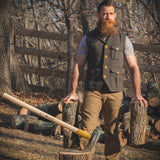 Chopping wood outside in the Ketchum Wool Leather Vest.