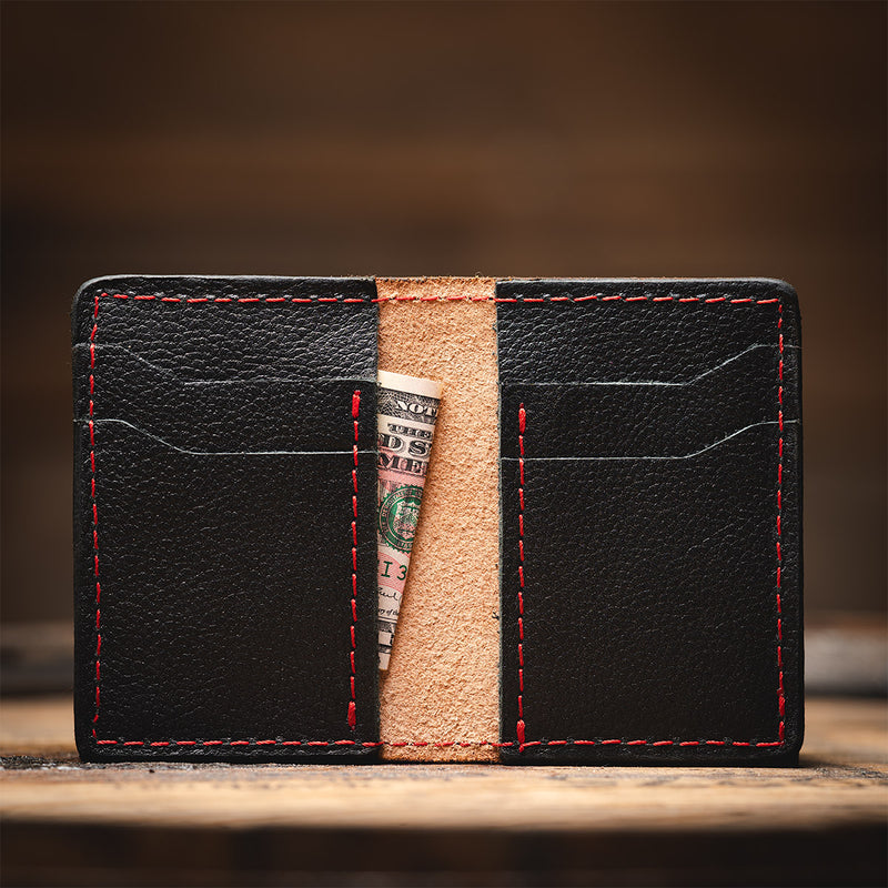 Gambler's wallet showing the 4 interior credit card pockets along with two interior pockets for cash or notebooks.