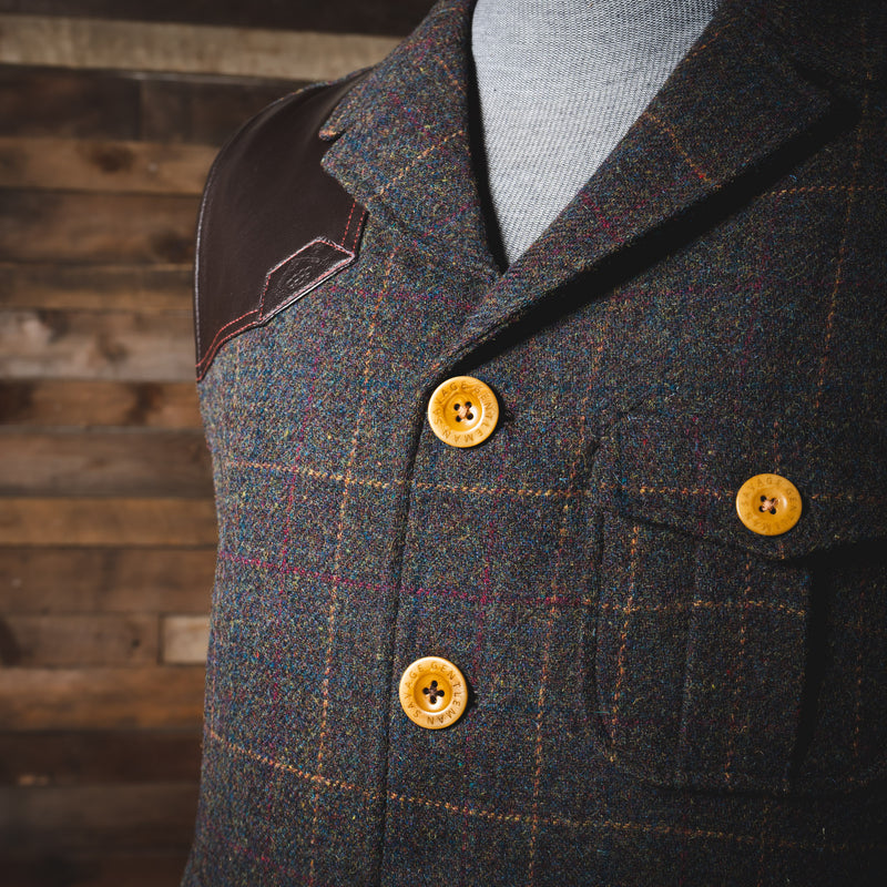 Savage Gentleman Ketchum Vest with custom buttons and beautiful red, yellow, and blue weave.